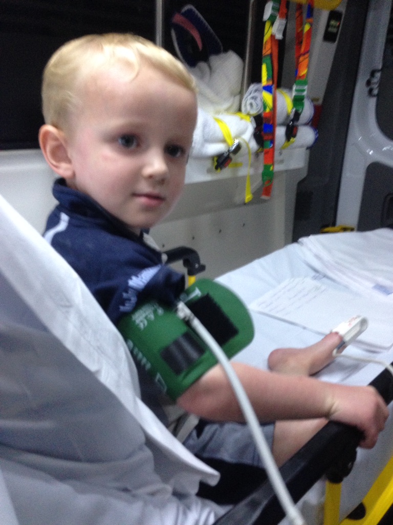 Byron in the back of an ambulance