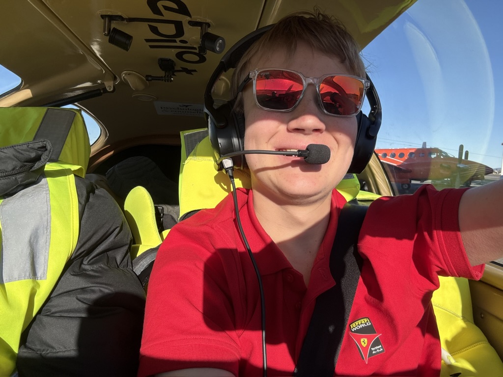 Cockpit · somewhere over the Pacific, headset on, world below